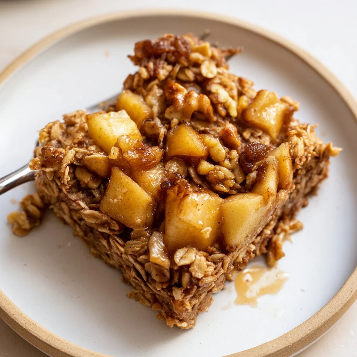 Maple-drizzled slices served with yogurt — Delicious Apple Cinnamon Oatmeal Bake Recipe For Mornings