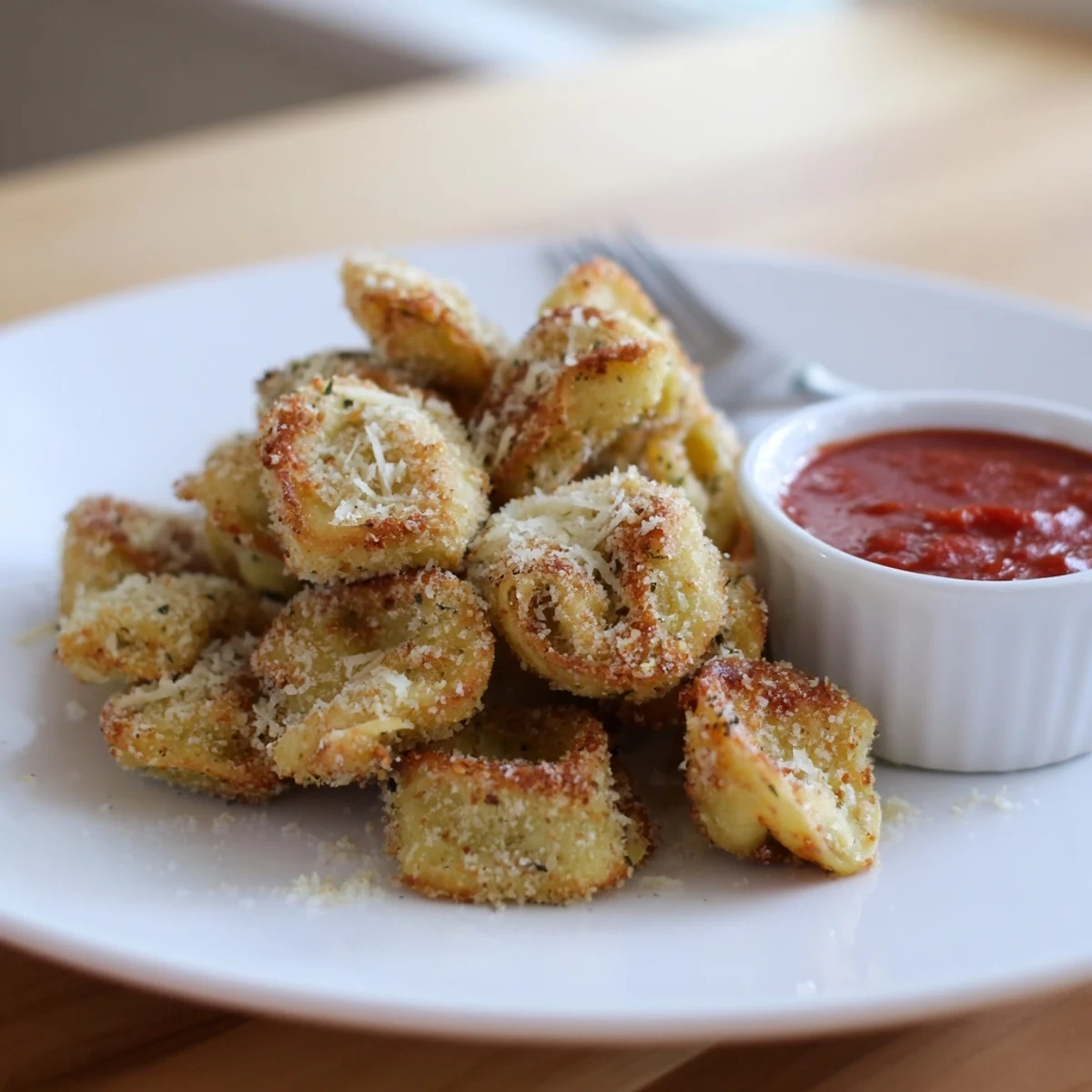 Plateful of golden bites, Crispy Tortellini Party Snacks Recipe, ready for guests.